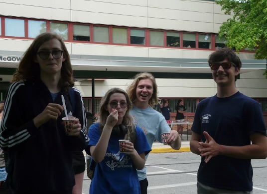 Friends eating Rita's and enjoying the sun.