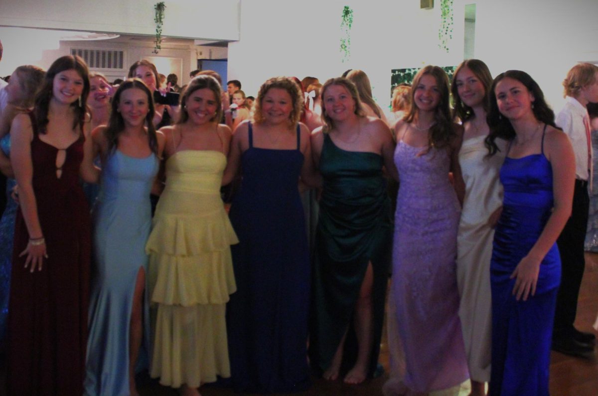Group of students, stepping onto the dance floor.