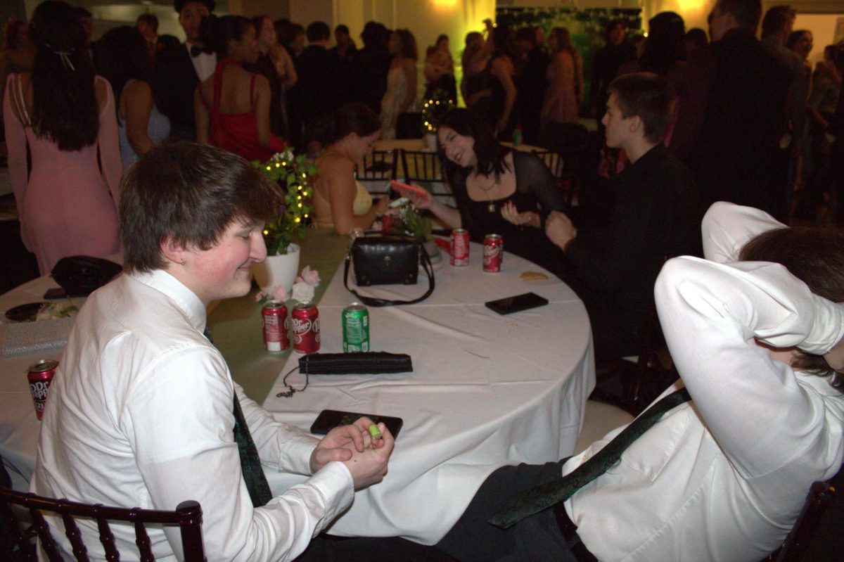Senior couple playing poker. (Horribly)