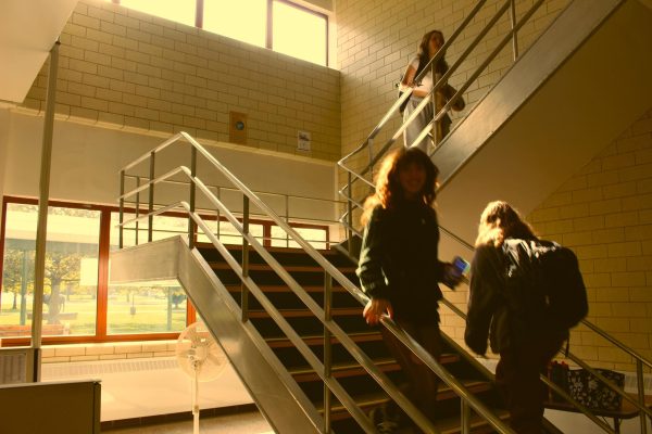 SCHOOL'S OUT: Jenna Coller races down the McGowan staircase.