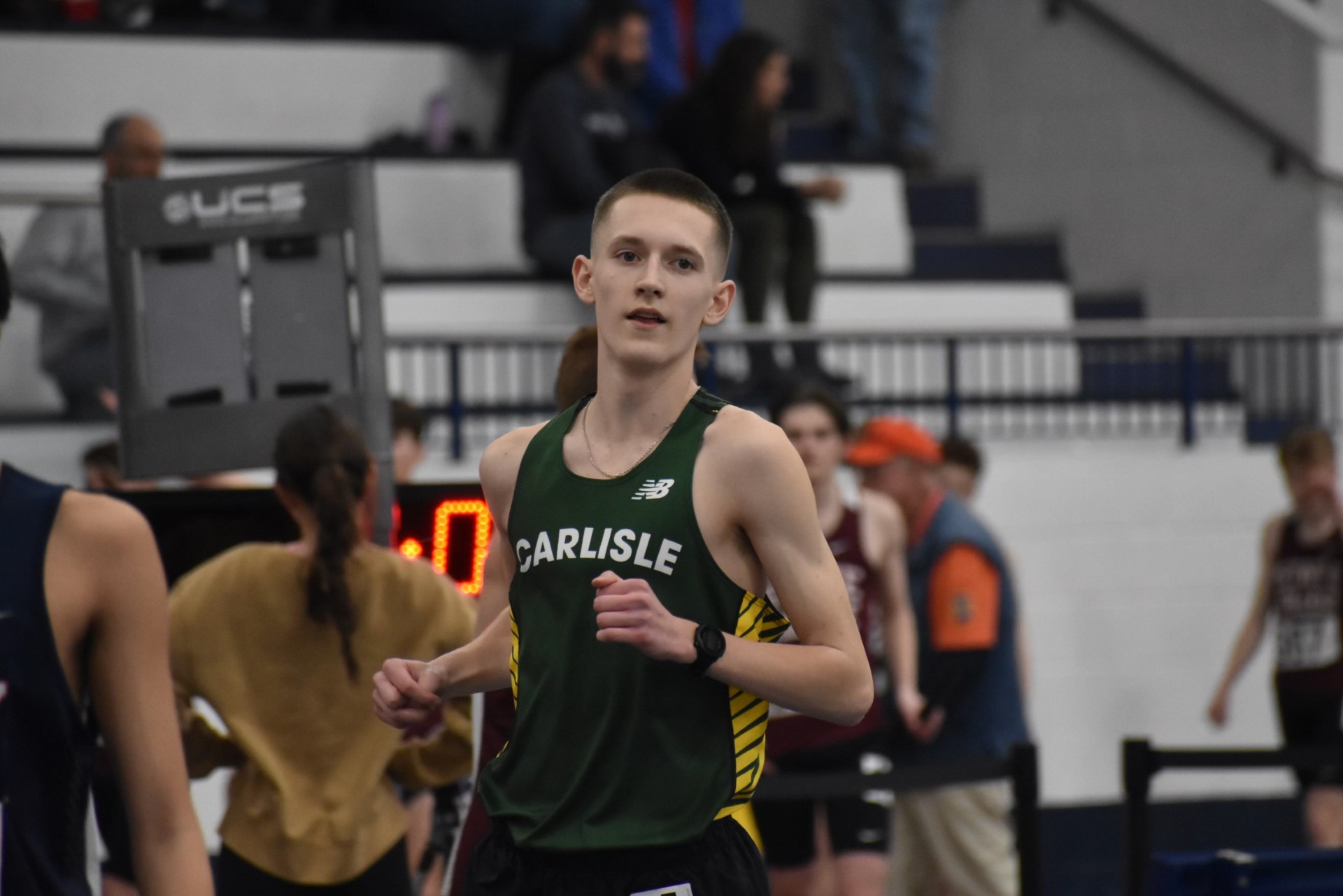 Kolbin looks towards the finish line as he races for 1st.