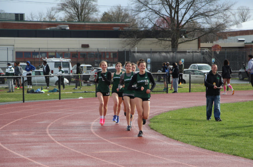 The track team sprinting to the finish. 